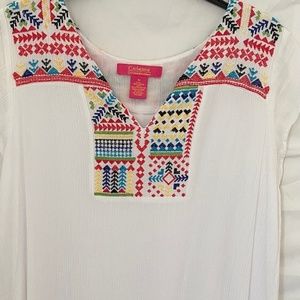 White Catherine Malandrino with colorful embroidered details on the top